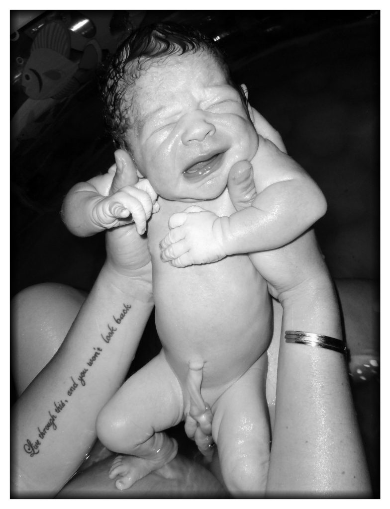 The moment of birth, photograph by Candace Leach (midwife extraordinaire)